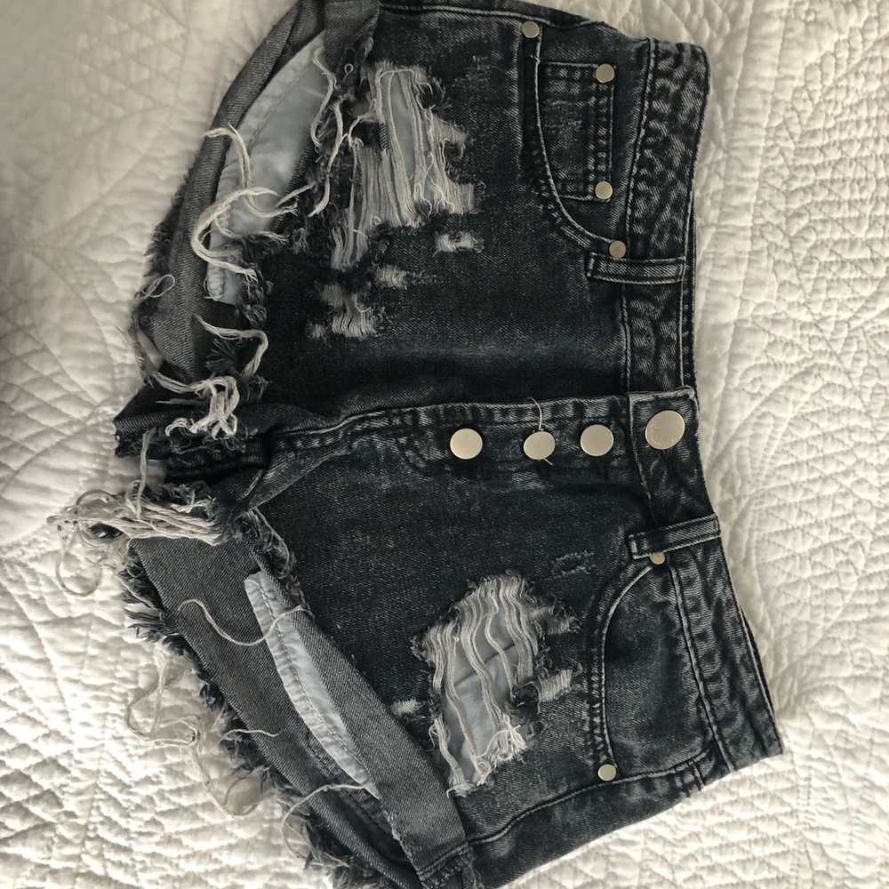 Ripped dark wash denim shorts